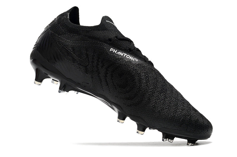 Chuteira Nike Phantom GX Low Elite FG Campo